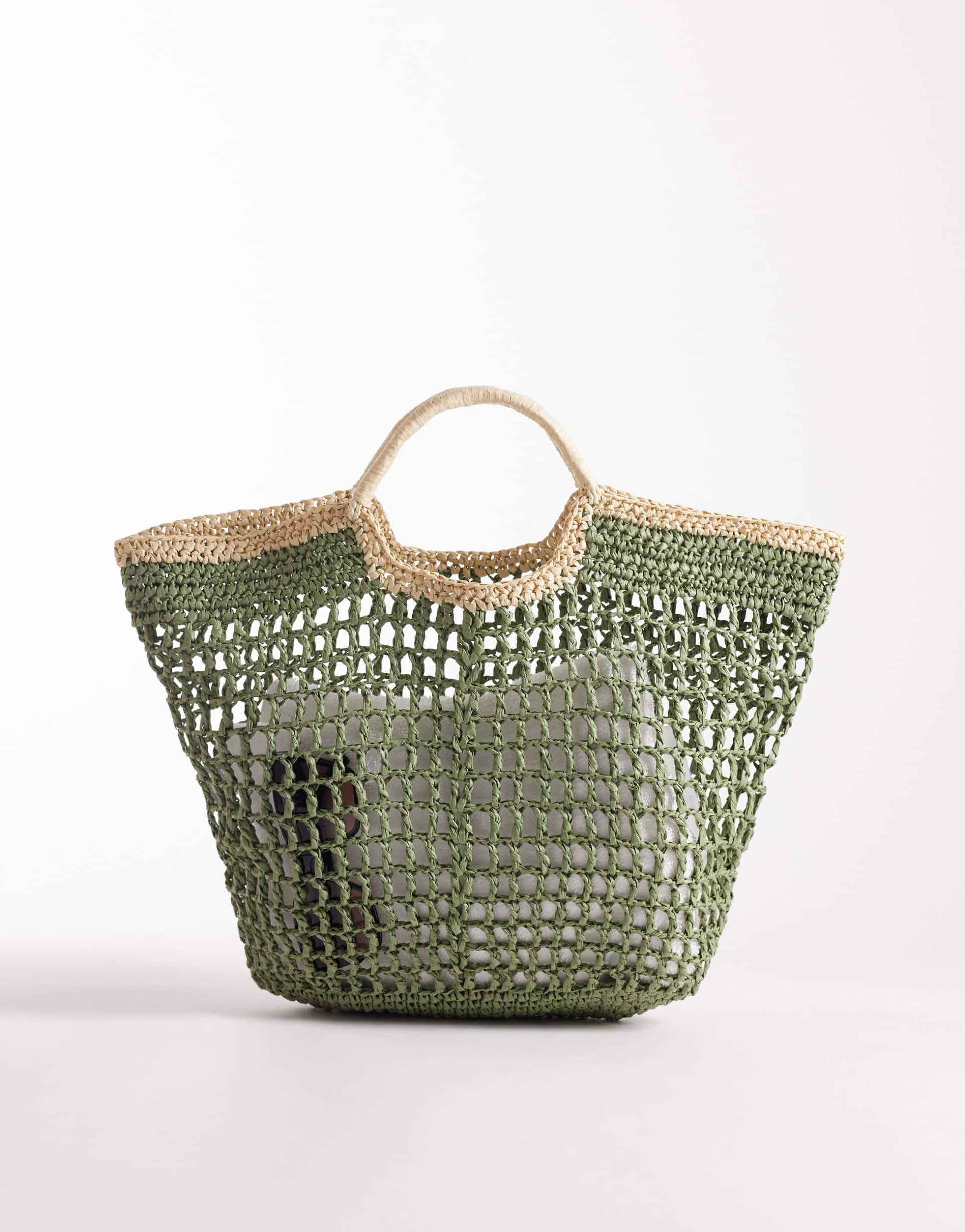 south beach top handle straw bag in green with contrast trim