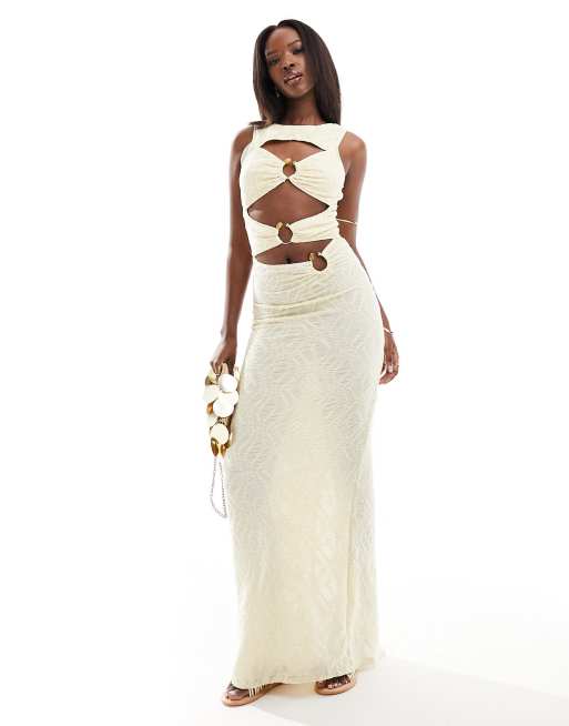 South Beach - Vestito lungo testurizzato color crema con cut-out e dettagli ad anello sul davanti