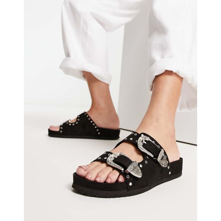 Buckle best sale flip flops