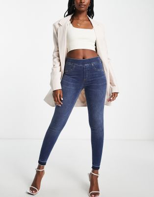 distressed ankle skinny jeans spanx