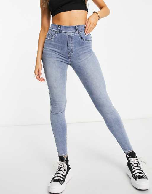 Spanx – Jasnoniebieskie obcisłe jeansy z podwyższonym stanem 