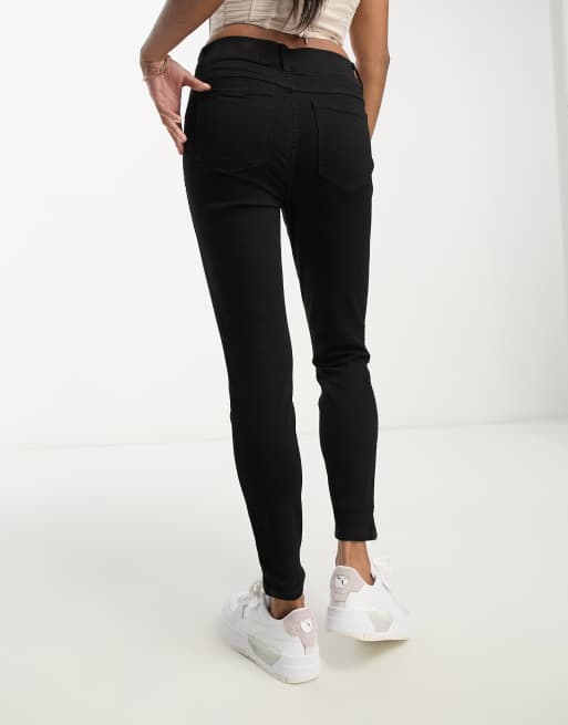 Spanx Petite ankle skinny jeans in black ASOS
