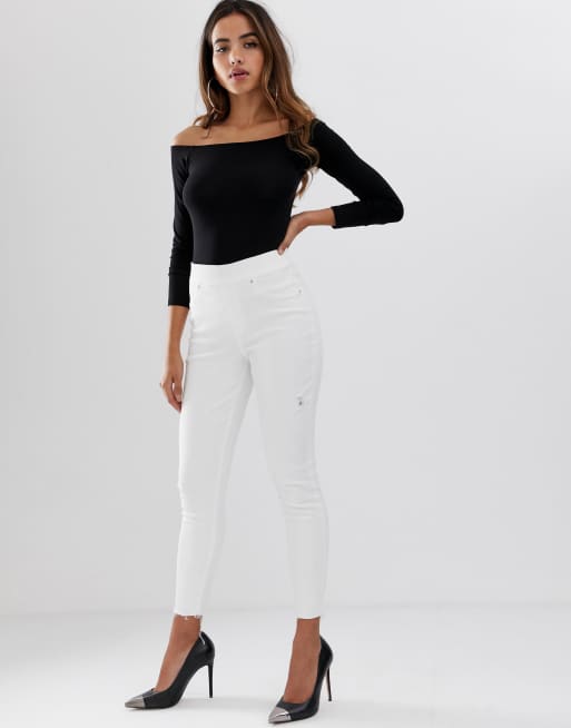 Spanx shape and lift distressed skinny jeans