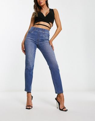 Spanx straight leg jeans in mid wash