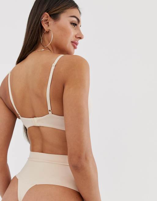 Spanx undie-tectable thong in beige, 2 of 4