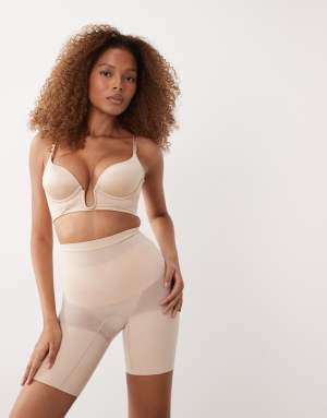 SPANXsculpt Seamless Power mid-thigh short with non slip waistband in beige