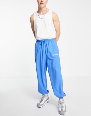 Спортивные джоггеры в стиле oversized из мягкой на ощупь ткани от комплекта COLLUSION-Голубой