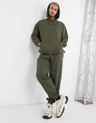 фото Спортивный костюм в стиле oversized с худи и джоггерами цвета хаки asos design-зеленый