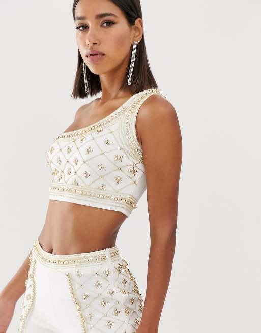 Starlet embellished longline one shoulder crop top in white and