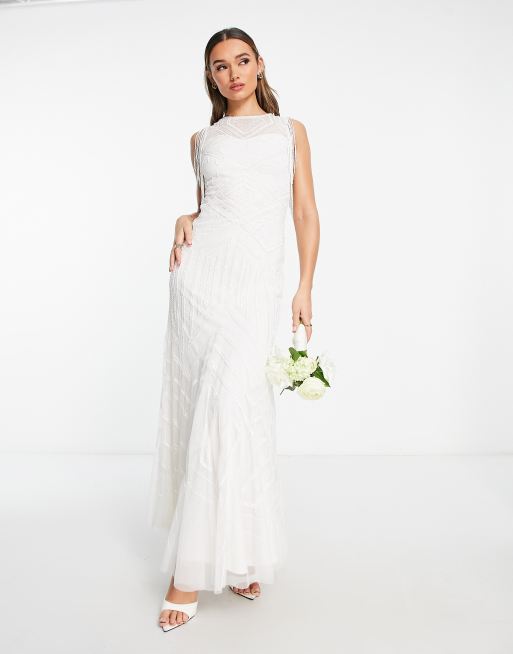 Starlet - Exclusivité - Robe longue de mariée à mancherons et franges - Ivoire