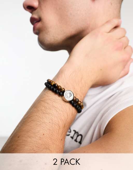 Steve Madden – 2er-Pack Perlenarmbänder in Braun und Schwarz mit Münzanhänger