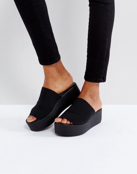 Steve Madden – Anschmiegsame, schwarze Sandalen mit Plateausohle
