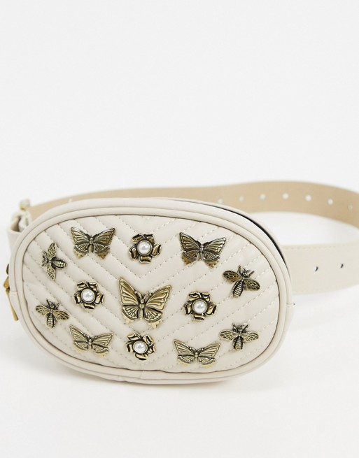 Steve Madden belt bag with bug embellishment in ivory