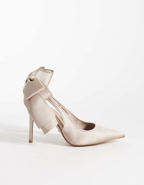 Steve Madden – Beżowe satynowe buty na obcasie z paskiem za piętą i kokardką - view 1