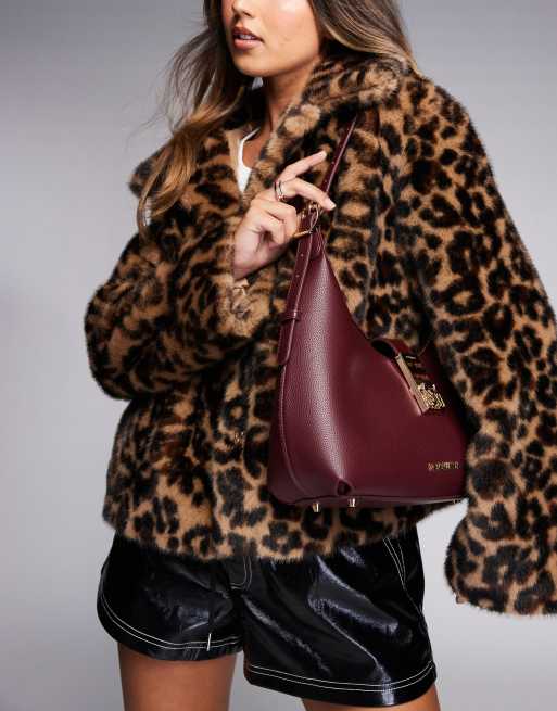 Steve Madden - Bovie - Sac porte épaule croissant de lune à détails métalliques dorés - Lie-de-vin