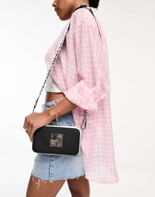 Steve Madden Brisa cross body bag in black and white ASOS