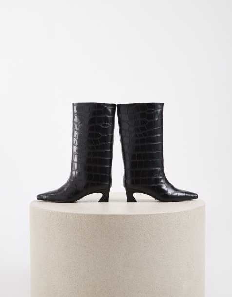 Steve Madden Carousel ankelboots med taxklack, spetsig tå och medelhögt skaft i svart ormmönster - view 1