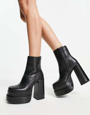 Shop Steve Madden Cobra Platform Heeled Boots In Black Leather