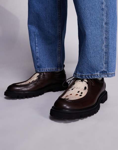 Steve Madden cow print detail chunky lace up loafers in black - view 1