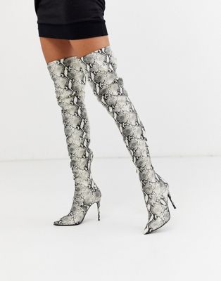 snake print thigh high boots
