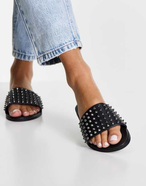 Steve Madden Farryn studded slider sandals in black leather ASOS