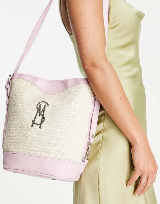 Steve Madden - Geweven bucket bag met kaarthouder in kauwgomroze