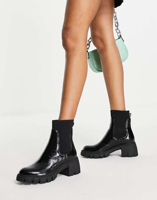 Steve Madden - Halton - Verfijnde chelsea boots met hak en dikke zolen in zwart lakleer