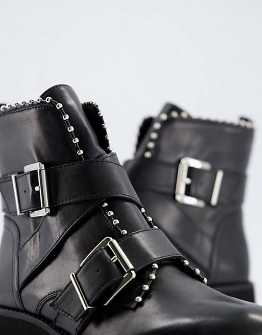 apenas Idealmente máquina Steve Madden Hoofy double buckle leather flat ankle boots in black | ASOS