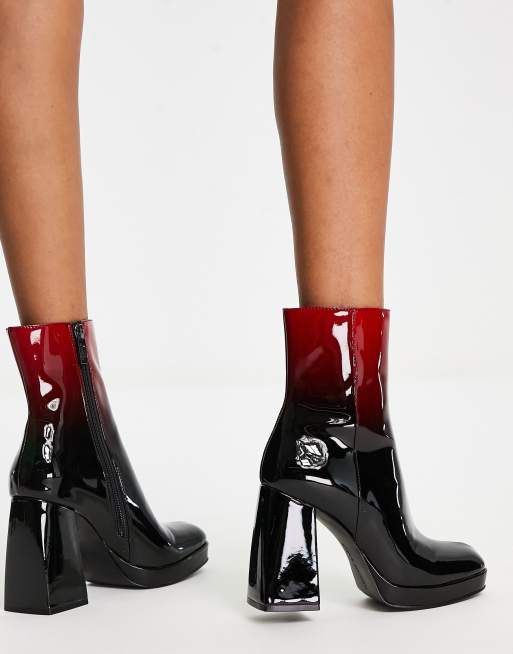 Steve madden boots with red zipper up the clearance back