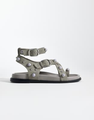  Linear studded footbed sandals with buckle strap  suede