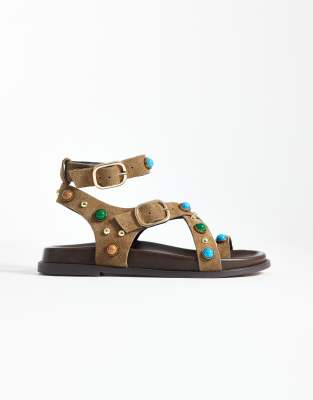  Linear studded footbed sandals with buckle strap in taupe suede