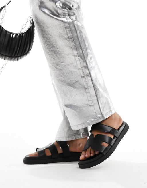 Steve Madden – Missile – Svarta tofflor med läderremmar