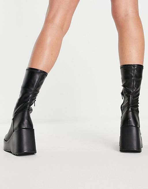 Goodwill Inspectie Bandiet Steve Madden Proceed wedge boots in black | ASOS