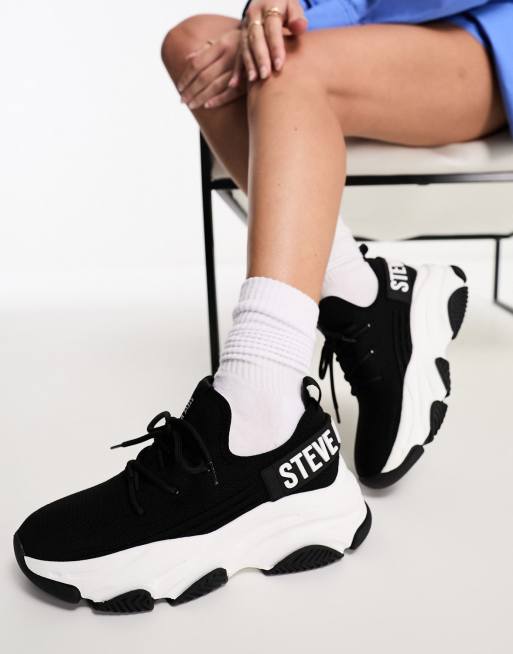 Steve madden black sales and white sneakers