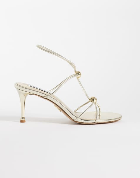 Steve Madden Ramos sandal med klack och gulddetalj i guld - view 1