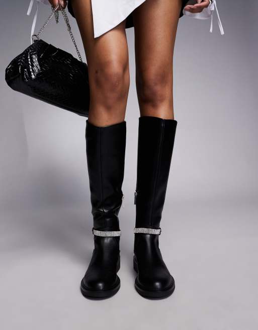 Steve Madden Riggs riding boots with embellished strap in black ASOS