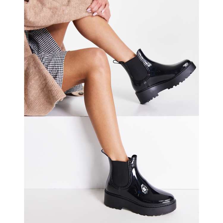 Steve madden rubber on sale boots