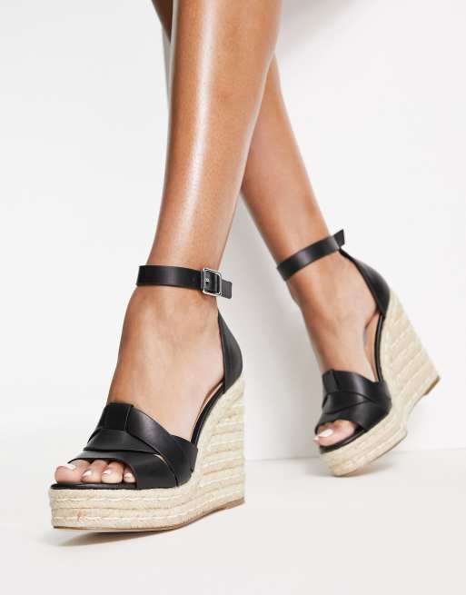 Steve Madden Sivian Leder Espadrilles in Schwarz mit uberkreuzten Riemen und Keilabsatz ASOS