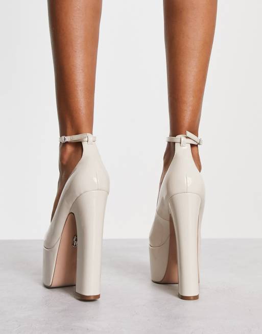 Bone patent leather store pumps