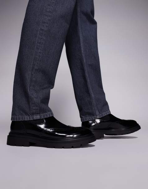 Steve Madden Stancie chelsea boots with brogue detail in black - view 1