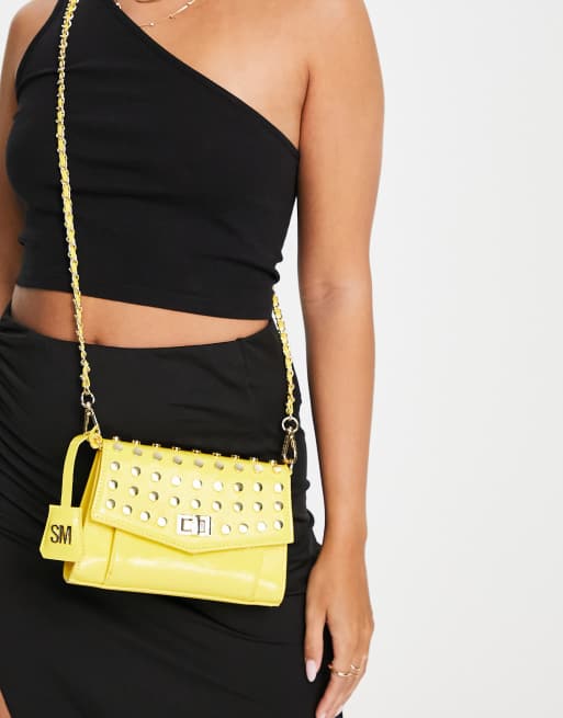 No Boundaries yellow patent crossbody bag. munimoro.gob.pe