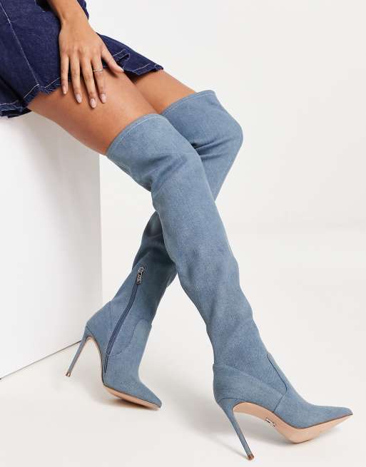 Blue jean over shop the knee boots