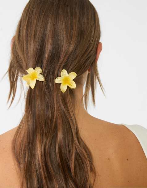 Stradivarius – 3er-Pack blumenförmige Haarspangen in Gold-Optik - view 1