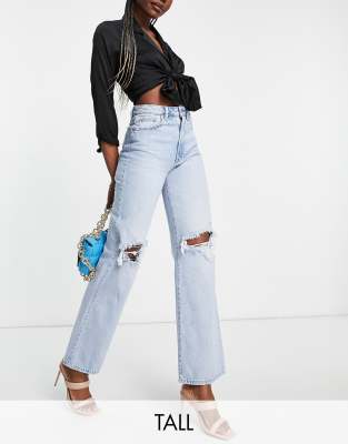 Stradivarius 90s dad jeans with rips in light wash