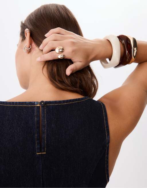 Stradivarius – Ärmelloses Jeans-Schößchenoberteil in überfärbtem Blau, 2 von 4