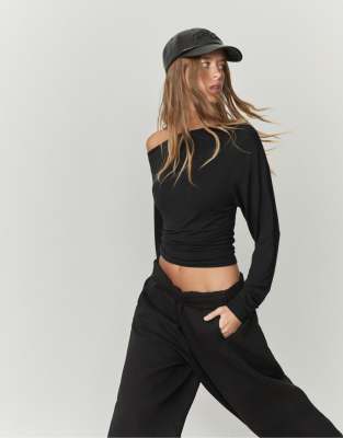 Stradivarius Asymmetrical neckline top in black | ASOS