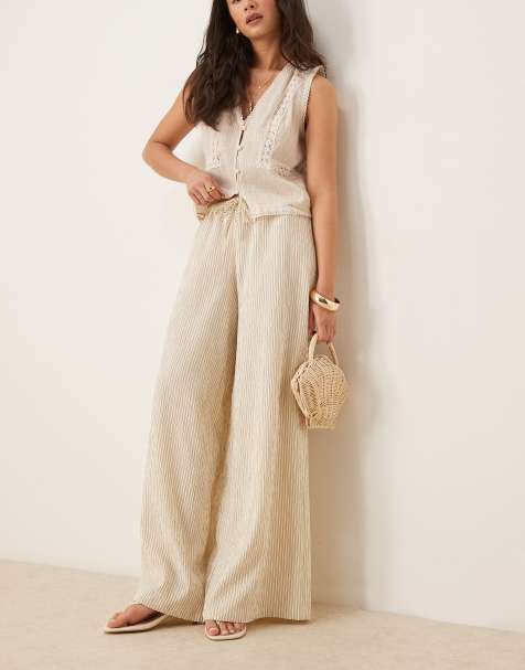 Stradivarius – Beige, randiga byxor i linnelook med vida ben - view 1