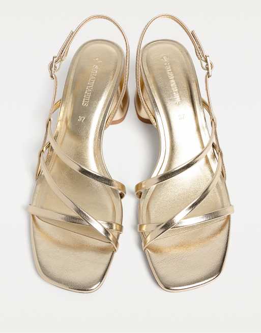 Stradivarius block heel sandals in gold | ASOS