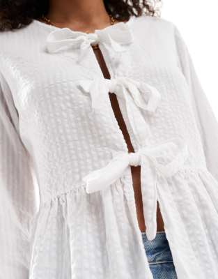 Stradivarius bow front puff sleeve top in white | ASOS