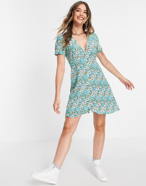 Stradivarius button front mini dress in green floral | ASOS